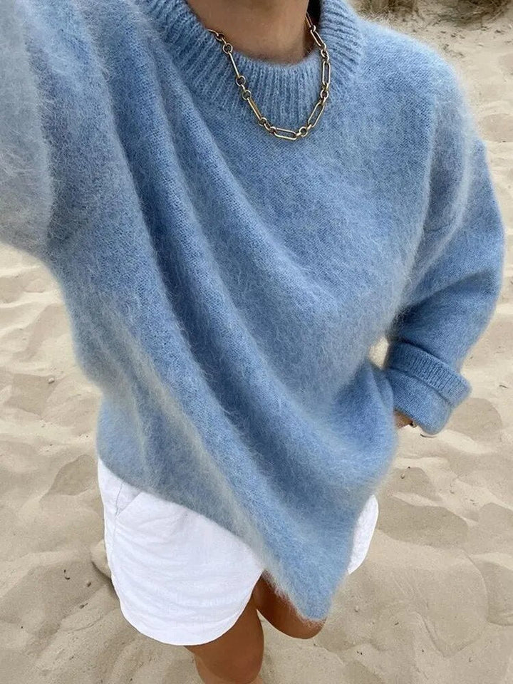 Versatile women's Luna sweater, a cozy top with an elegant design, perfect for any casual or stylish look.