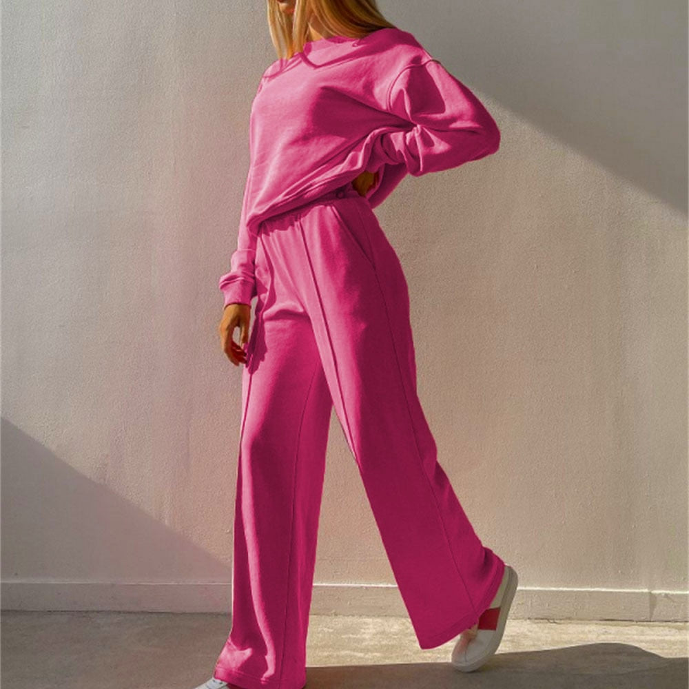 Stylish women's athleisure 2-piece tracksuit. Comfortable matching top and joggers for casual or lounge wear.