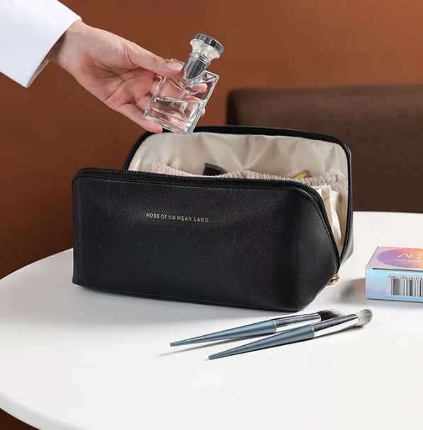 BelleVault luxe cosmetic organizer case filled with makeup & beauty products, ideal for travel.