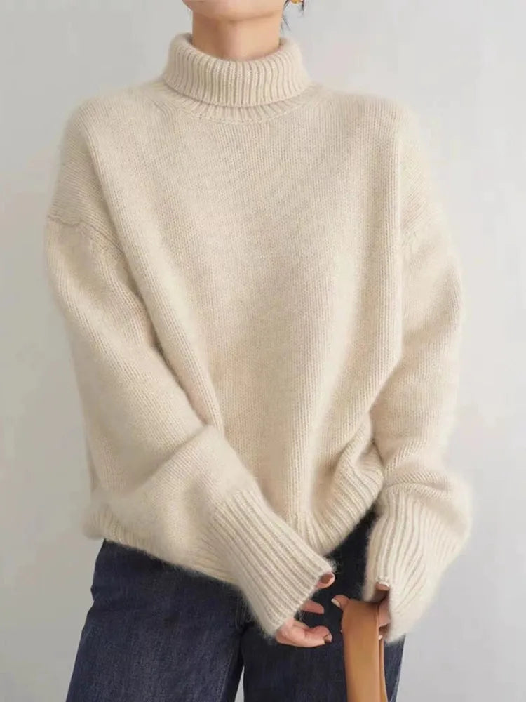 Elegant women's cashmere turtleneck sweater. A soft, luxurious knit pullover, offering warmth and stylish fall fashion.