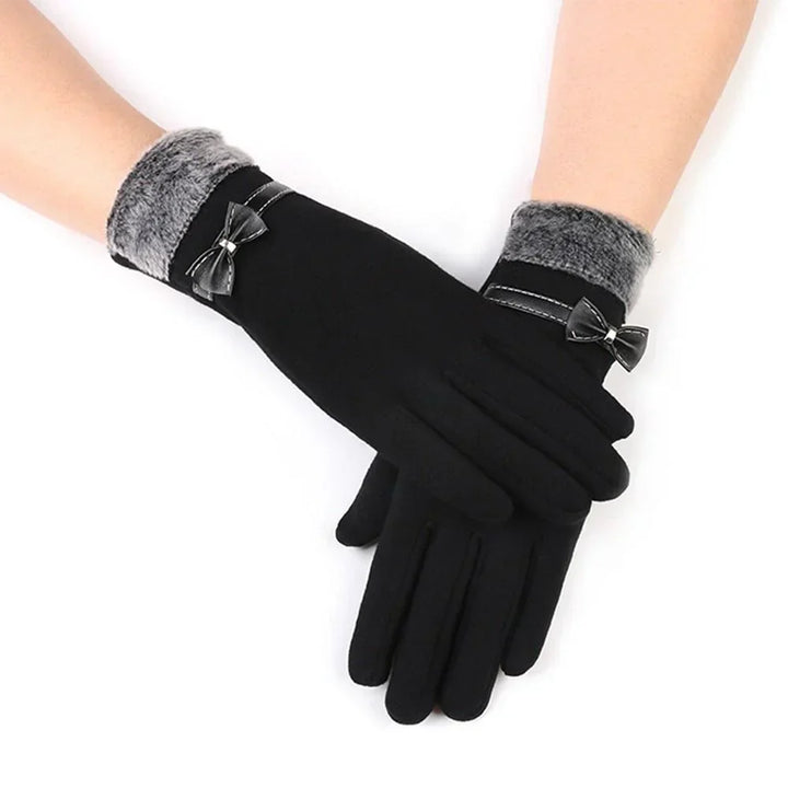 Luxe women's warm winter gloves with touchscreen capability. Ideal for phone use while keeping hands cozy in cold weather.