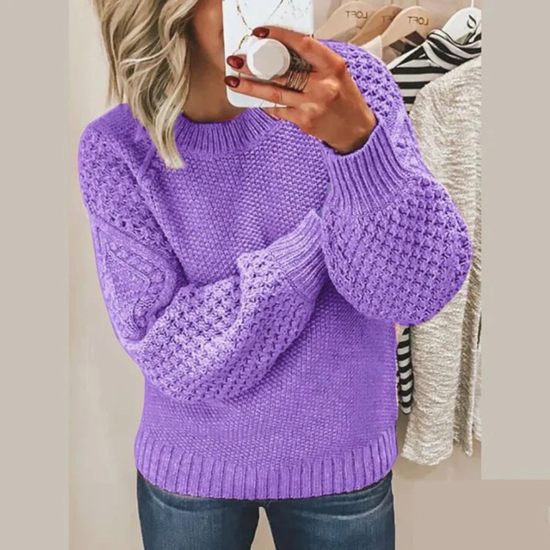 Aria women's luxury long-sleeve sweater, a chic and warm addition to ladies' apparel.