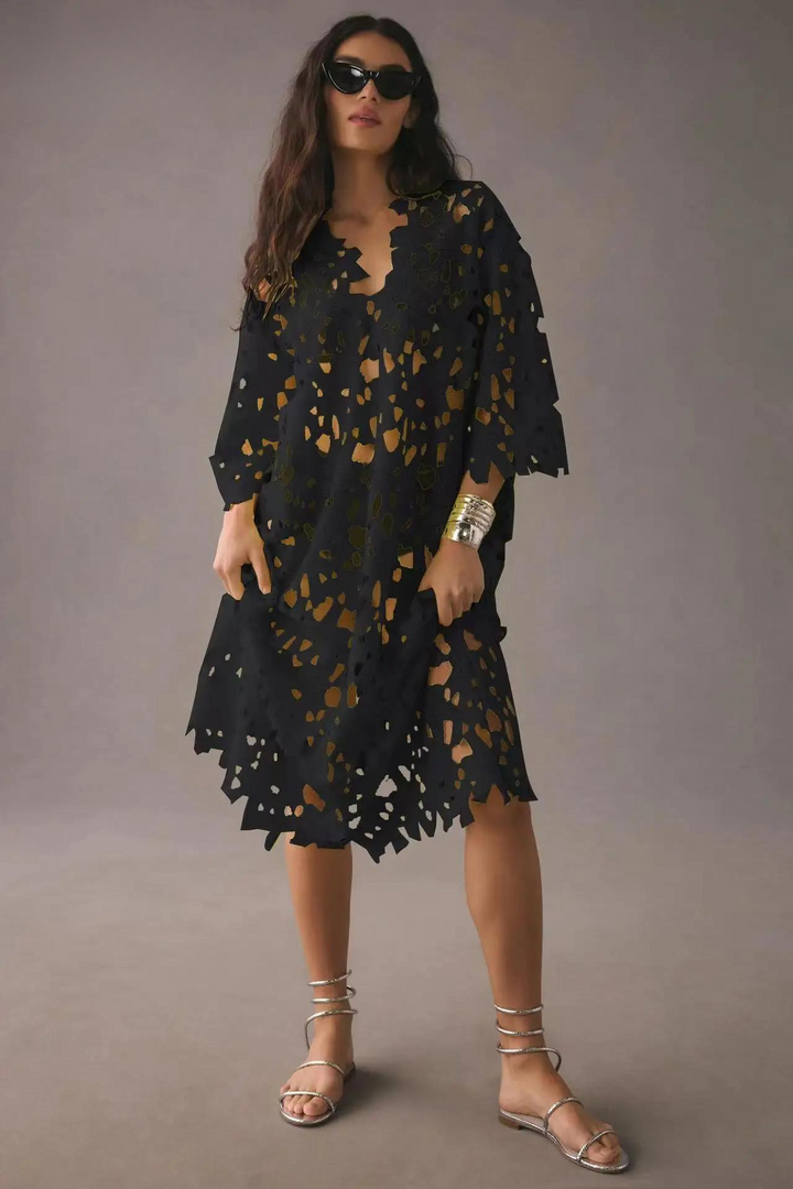 Elegant women's maxi dress, the Maribel, featuring a relaxed fit for comfortable vacation and resort wear.