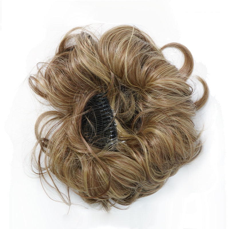 Realistic messy clip-in bun hair extension for women, blends seamlessly for a natural updo.