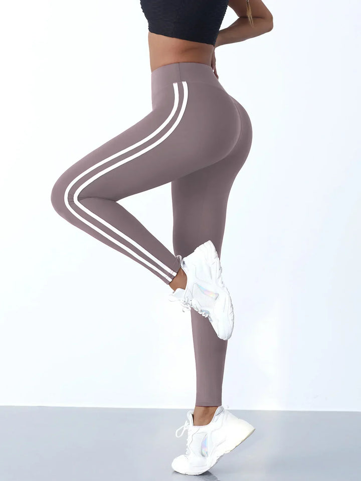 Figure-flattering Mila high waist yoga leggings, providing support for women's fitness & activewear.