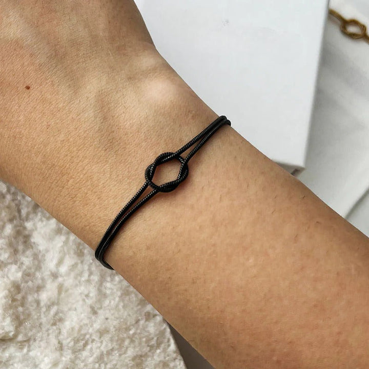 Unique knot design gold bracelet, a must-have minimalist piece for women.