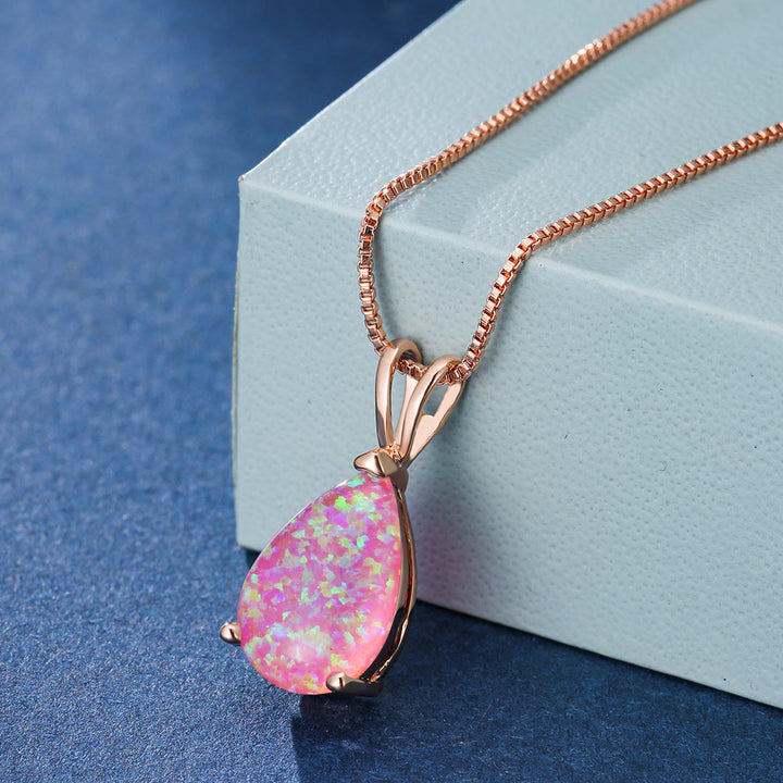 Rose gold minimalist opal necklace. Dainty drop pendant, perfect women's jewelry with adjustable chain.