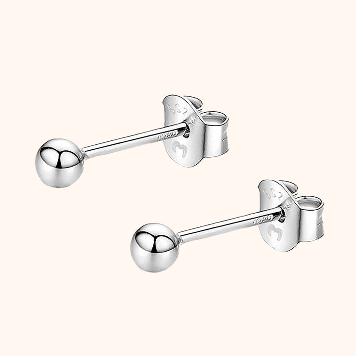 Delicate minimalist stud earrings for women, crafted from sterling silver with 18K gold plating.