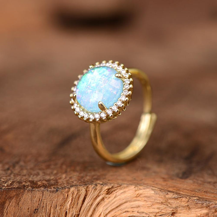 Women's mystical opal cocktail ring, a unique gemstone statement piece. Perfect for special occasions.