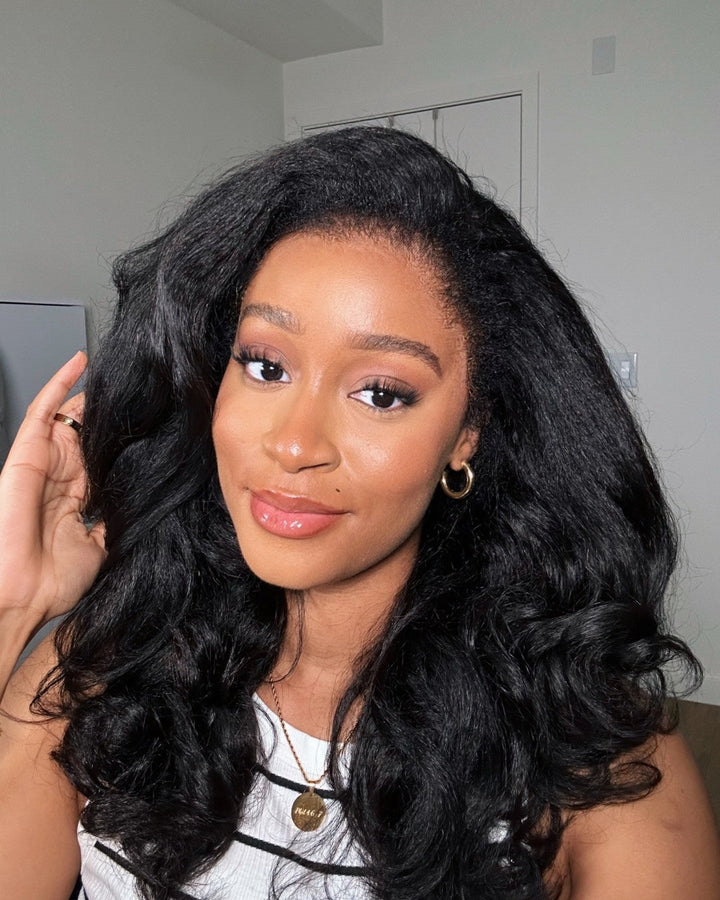 Elegant natural black body wave human hair wig with curly edges. Comfortable HD lace front, virgin hair for women.