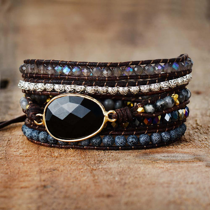 Women's natural black onyx & clear quartz wrap bracelet with healing stones, handmade on leather.