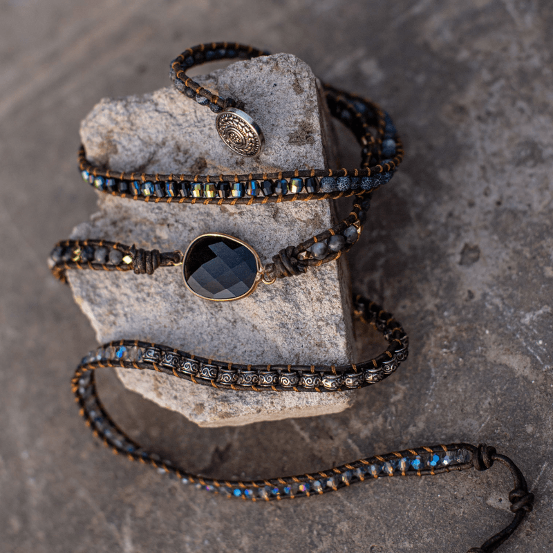Natural onyx and quartz women's bracelet, a handmade leather wrap design featuring spiritual healing stones.