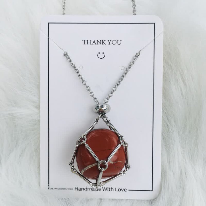 Delicate women's rose quartz pendant. Healing crystal gemstone on a dainty chain.