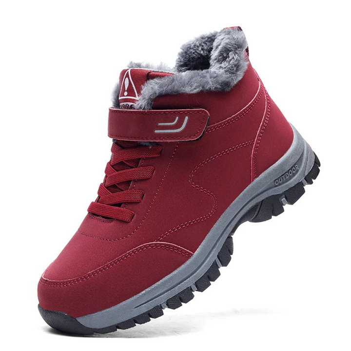 Side view of women's Nordic Comfort winter boots, showcasing ergonomic support & rugged slip-resistant sole.