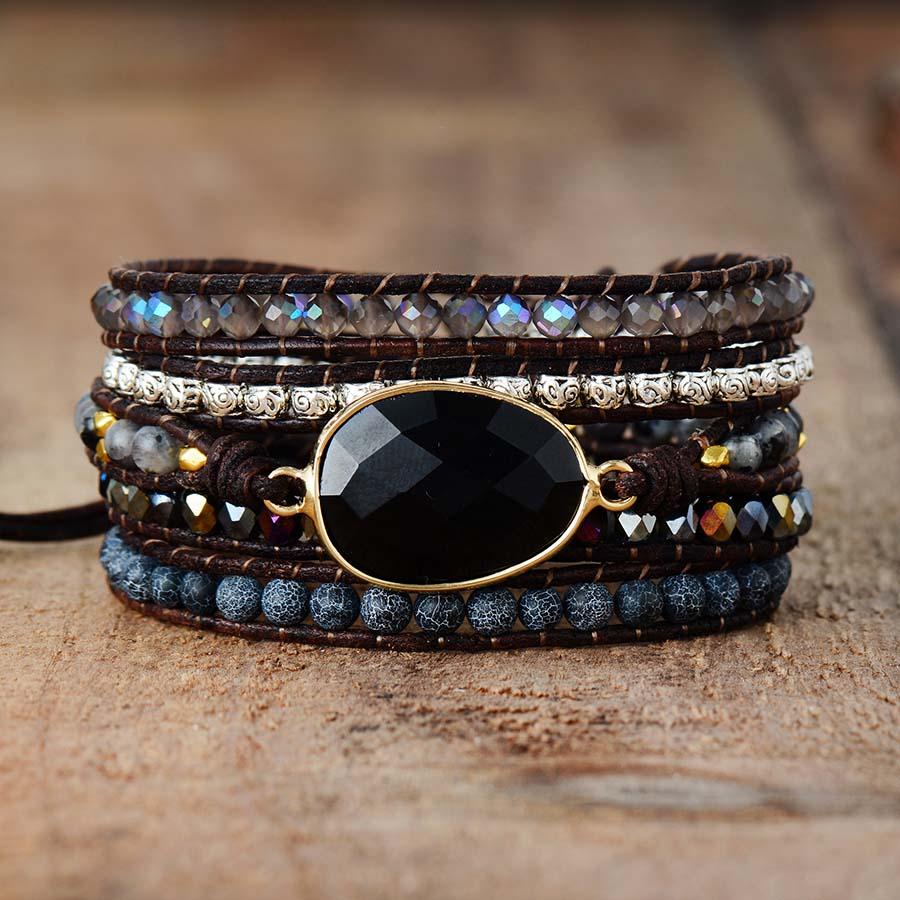 Detailed view of handcrafted Onyx Moonlight bracelet, featuring durable leather and protective onyx stones