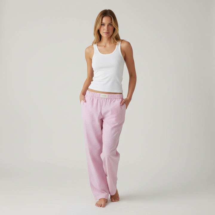 Comfortable Elvira lounge pants for women, made from soft organic cotton with a loose fit.