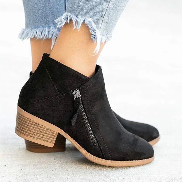 Stylish women's orthopaedic ankle boots offering foot support, perfect for comfortable fall & winter walking.