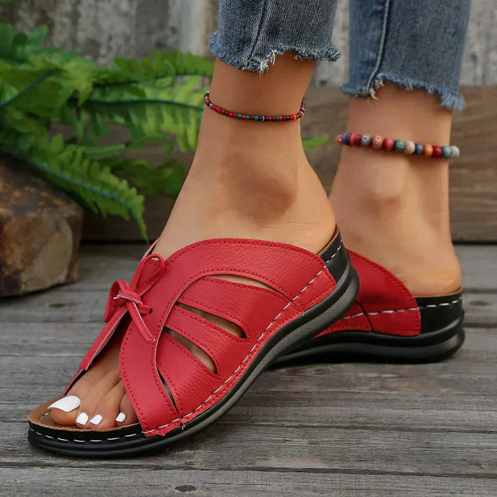 Women's wedge sandals with knot detail, orthopaedic for arch & bunion relief.