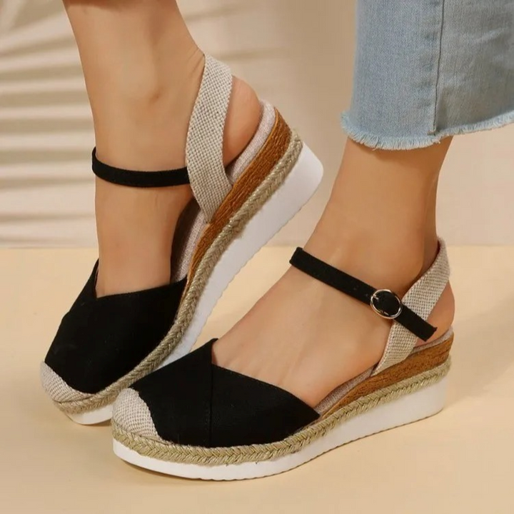 Women's orthopedic closed toe sandals with arch support, adjustable buckle, and comfortable design for daily wear.