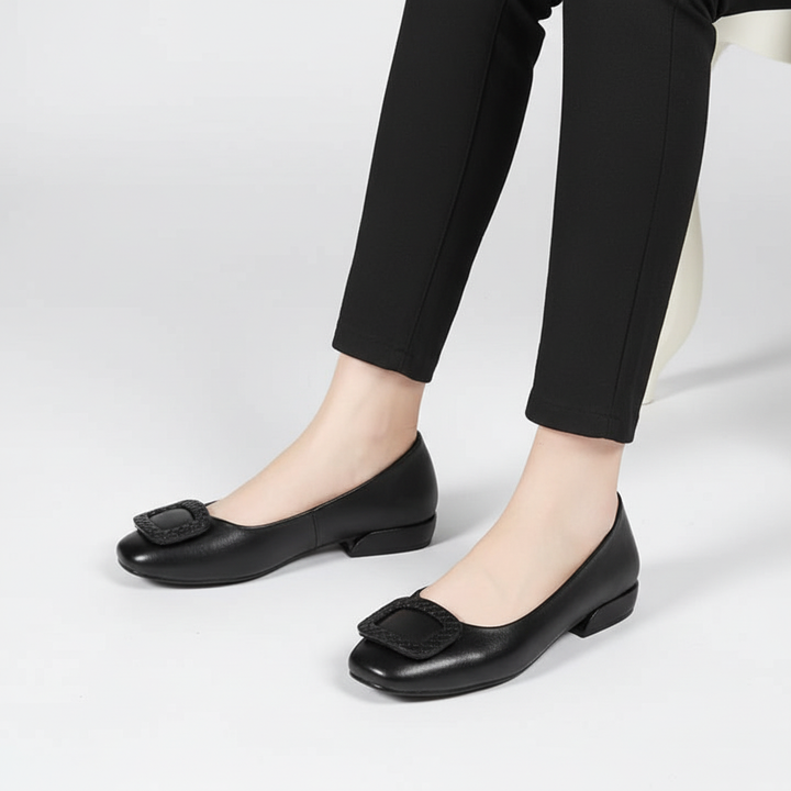 Black comfort flats for women with heel, designed for orthopedic posture support and all-day comfort.