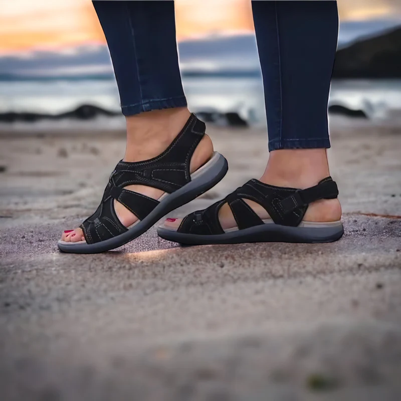 Comfortable women's orthopedic sandals, open-toe design. Adjustable summer shoes for versatile everyday wear.
