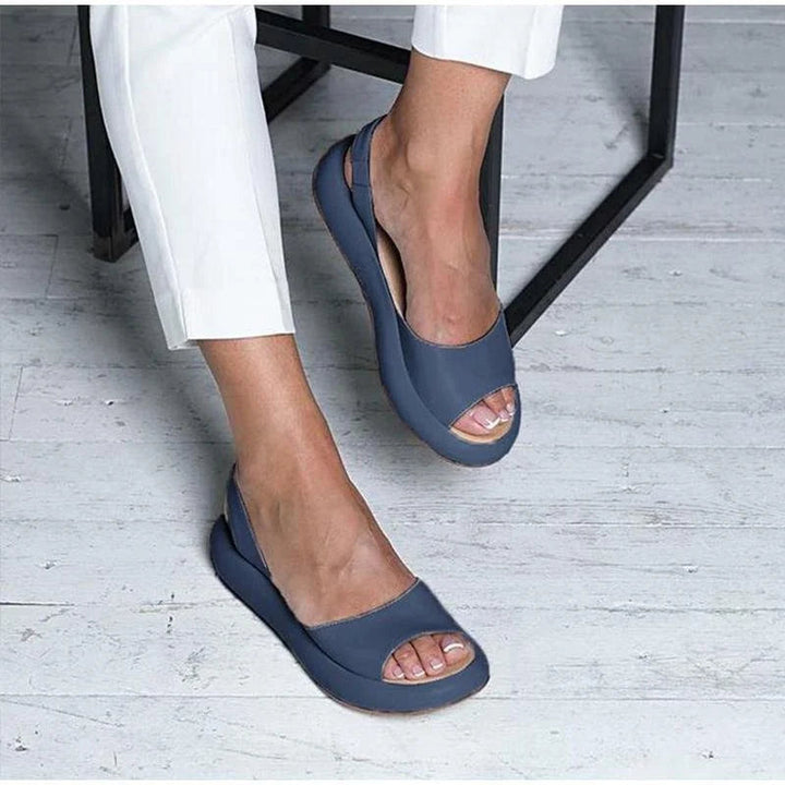 Breathable orthopedic comfort sandals for women, offering arch support & a low heel for walking.