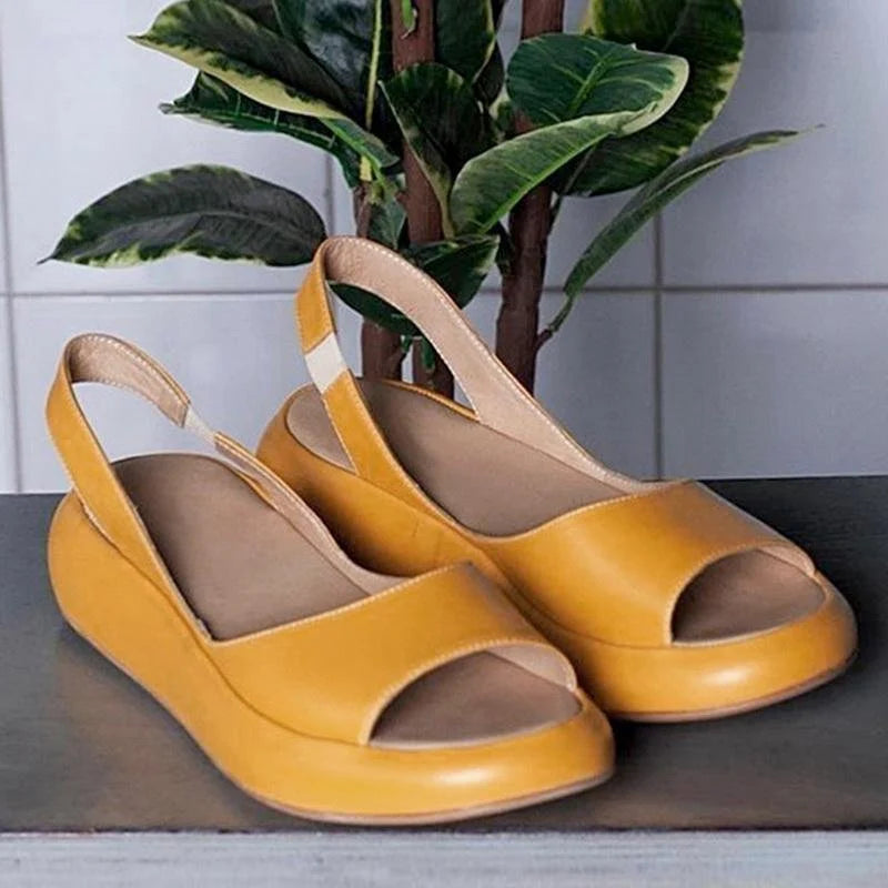 Comfortable women's orthopedic sandals with low heel, providing arch support for all-day summer wear.
