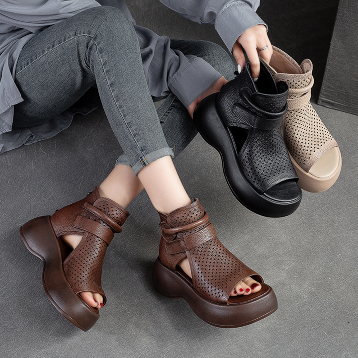 Durable women's leather orthopedic sandals, shock-absorbing for all-day comfort and support.