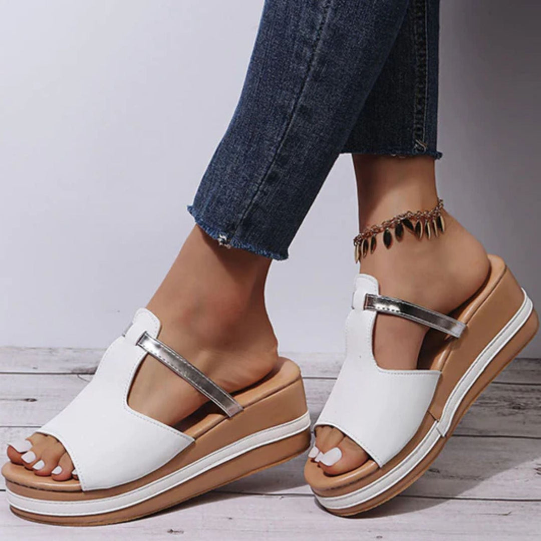 Ergonomic women's orthopedic sandals, raised sole for arch support & foot health. Stylish, comfortable summer shoes.