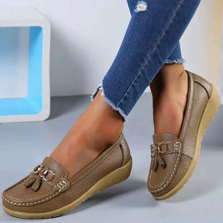 Women's orthopedic slip-on loafers. Stylish design for all-day comfort & foot support. Perfect for everyday wear.