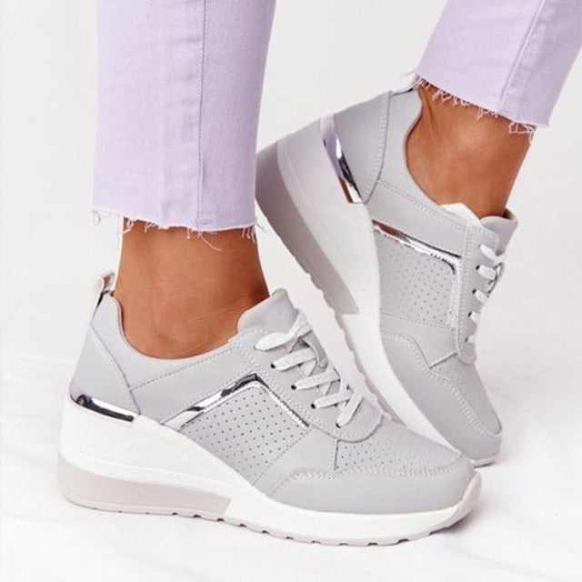 Comfortable orthopedic sneakers for women, offering arch support & cushioning for pain relief.