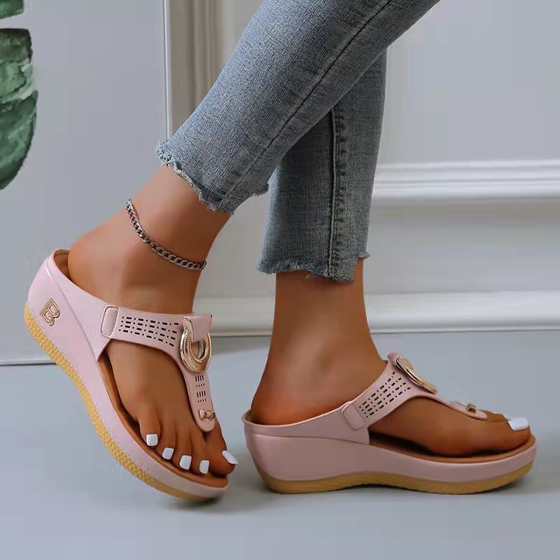 Close-up of women's orthopedic summer sandals, highlighting the arch support and comfortable vegan leather straps.