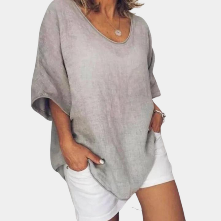 Model wearing an oversized cotton t-shirt for women, showcasing its loose fit and comfort for everyday wear