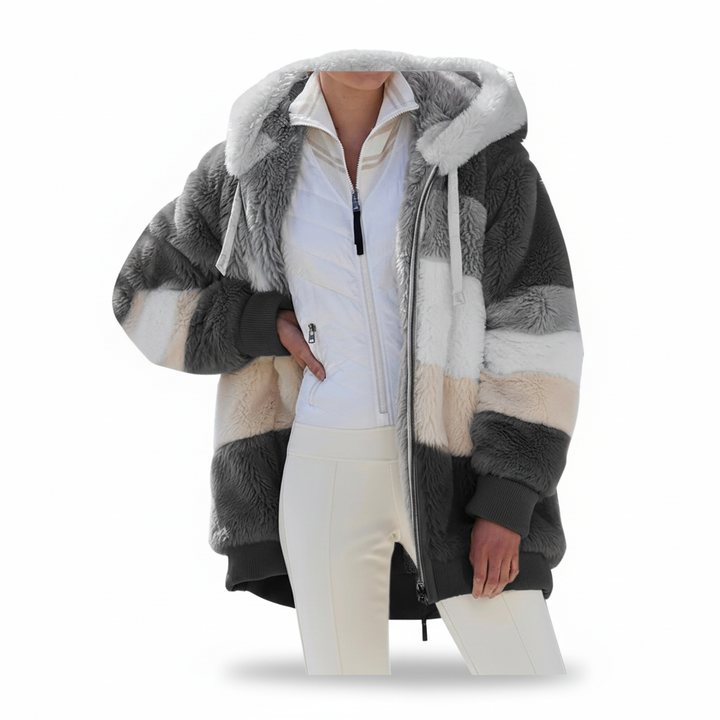 Versatile women's oversized fleece hooded vest, ideal for stylish layering and warmth