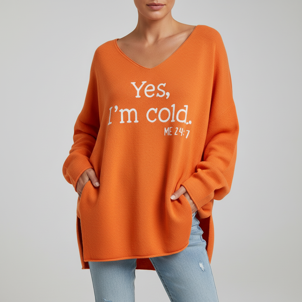 Warm women's V-neck sweater with casual oversized fit and stylish pattern