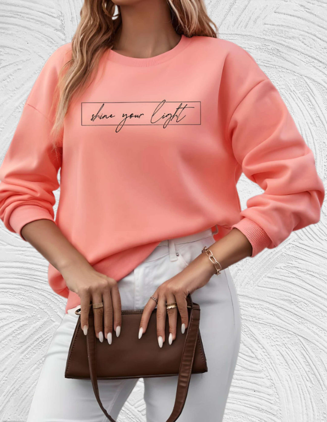 Comfortable oversized women's round neck sweater, a stylish essential for casual chic apparel.