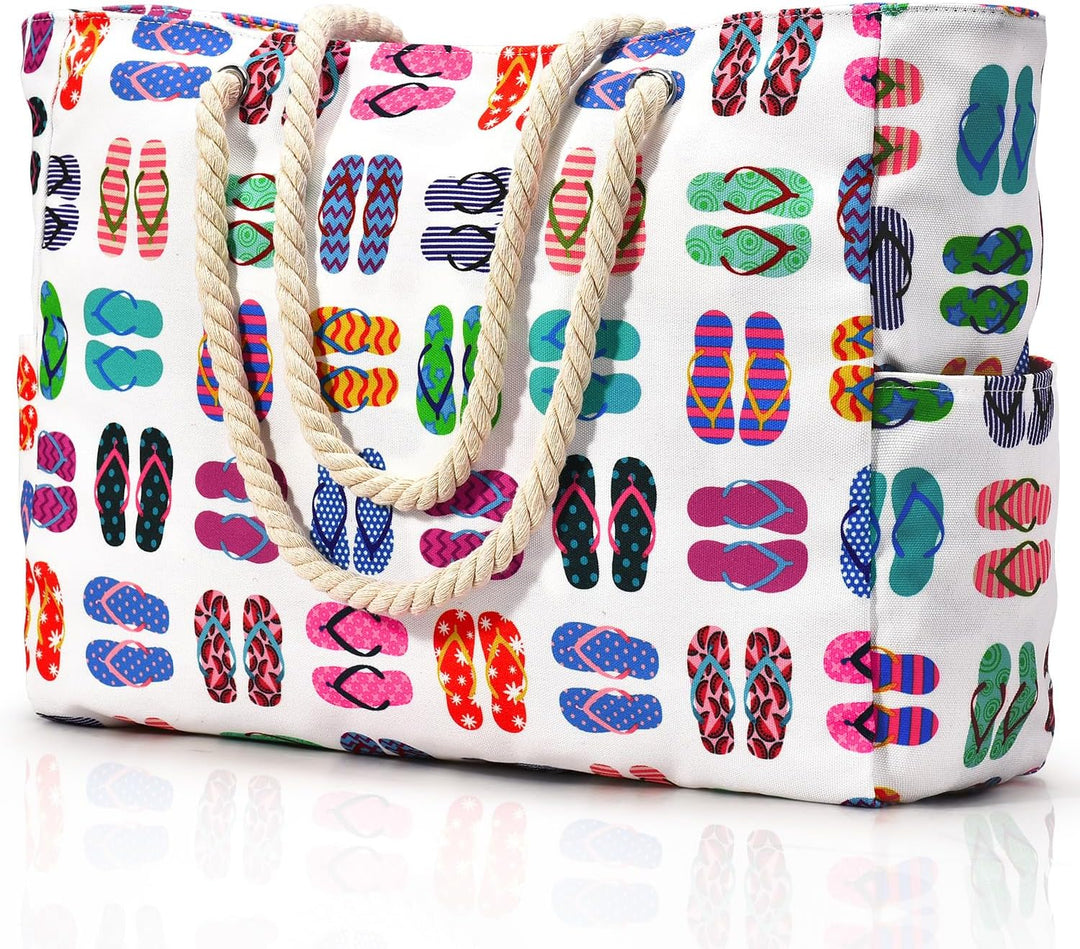 Spacious sandproof beach bag for women, ideal for towels, swimwear & accessories.