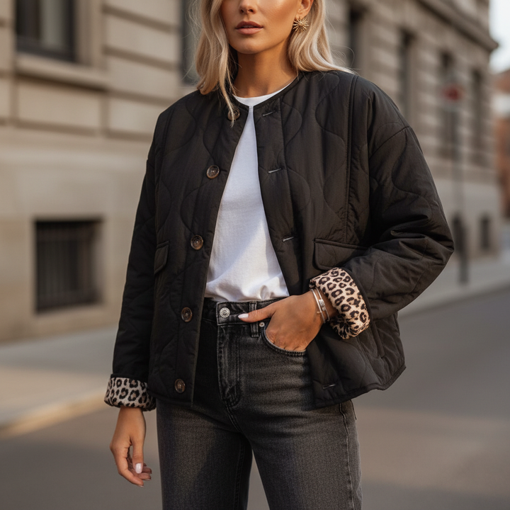 Women's padded jacket, tailored fit, featuring a stylish leopard print lining for winter wear.