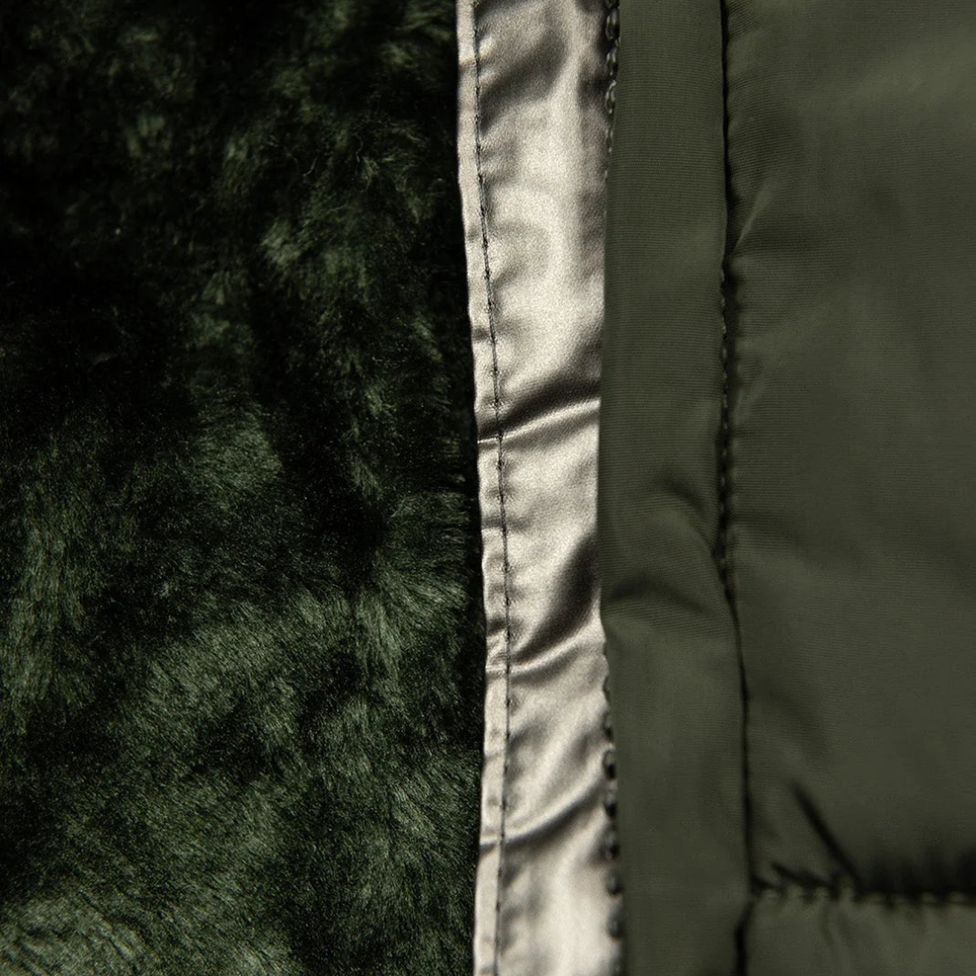 Padded waterproof women's winter coat. Long, warm jacket perfect for cold weather & everyday outdoor activities.