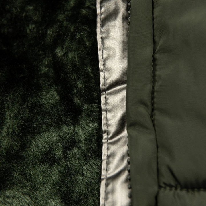 Padded waterproof women's winter coat. Long, warm jacket perfect for cold weather & everyday outdoor activities.