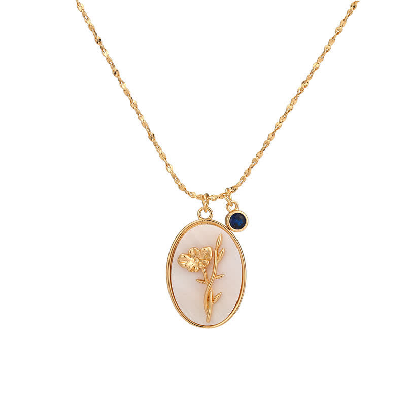 Silver personalized birth flower necklace with individual birthstone for women, delicate design.