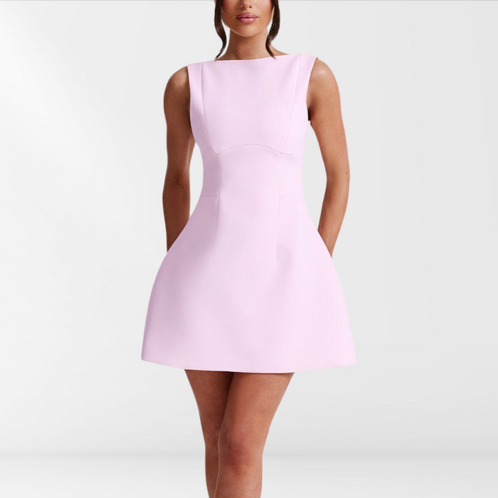 Women's pink halter neck sleeveless mini summer dress, ideal for parties, casual outings, or vacation wear.