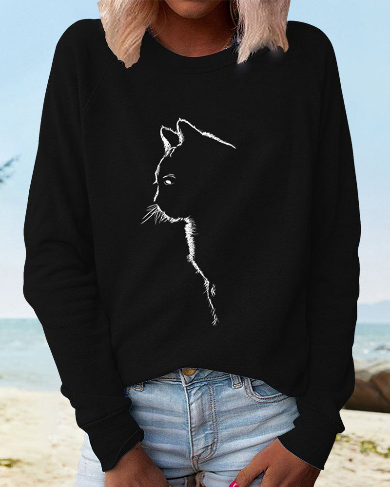 Women's playful cat print loose fit sweatshirt, ideal for casual everyday comfort.