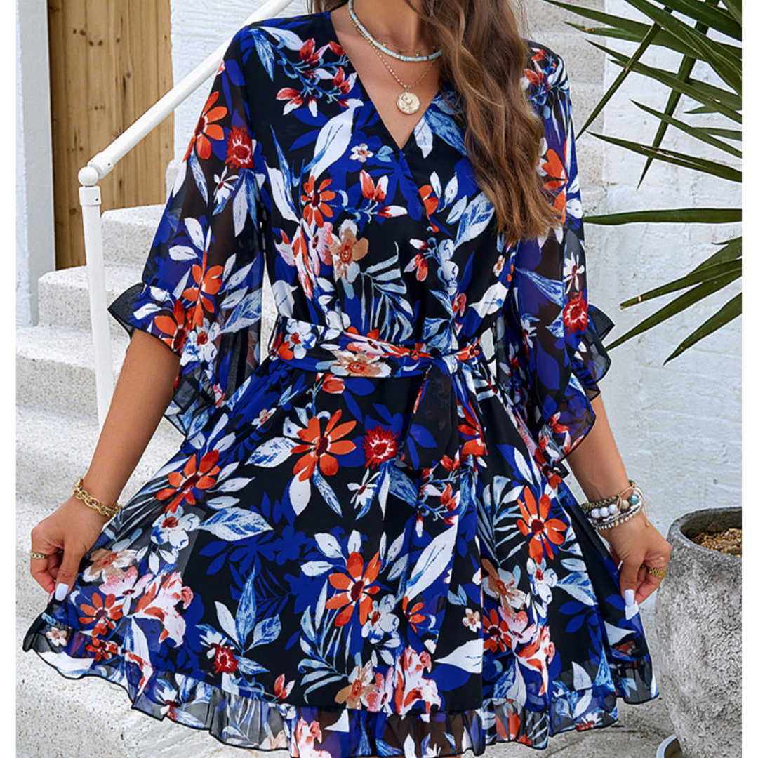 Stylish floral print mini dress for women with distinct bell sleeves, suitable for boho or vacation style.