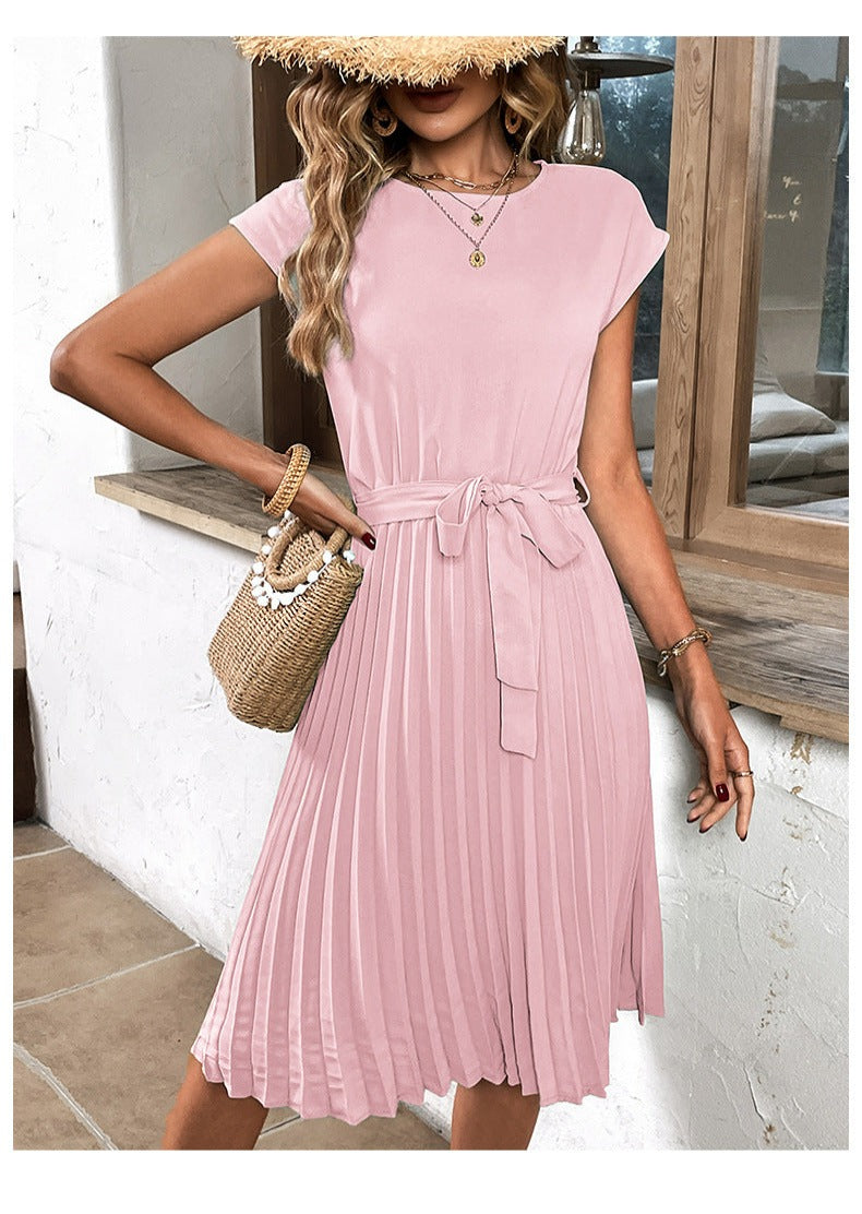 Elegant women's A-line summer dress, featuring pleats and short sleeves. Ideal for warm weather, offering comfort and style.