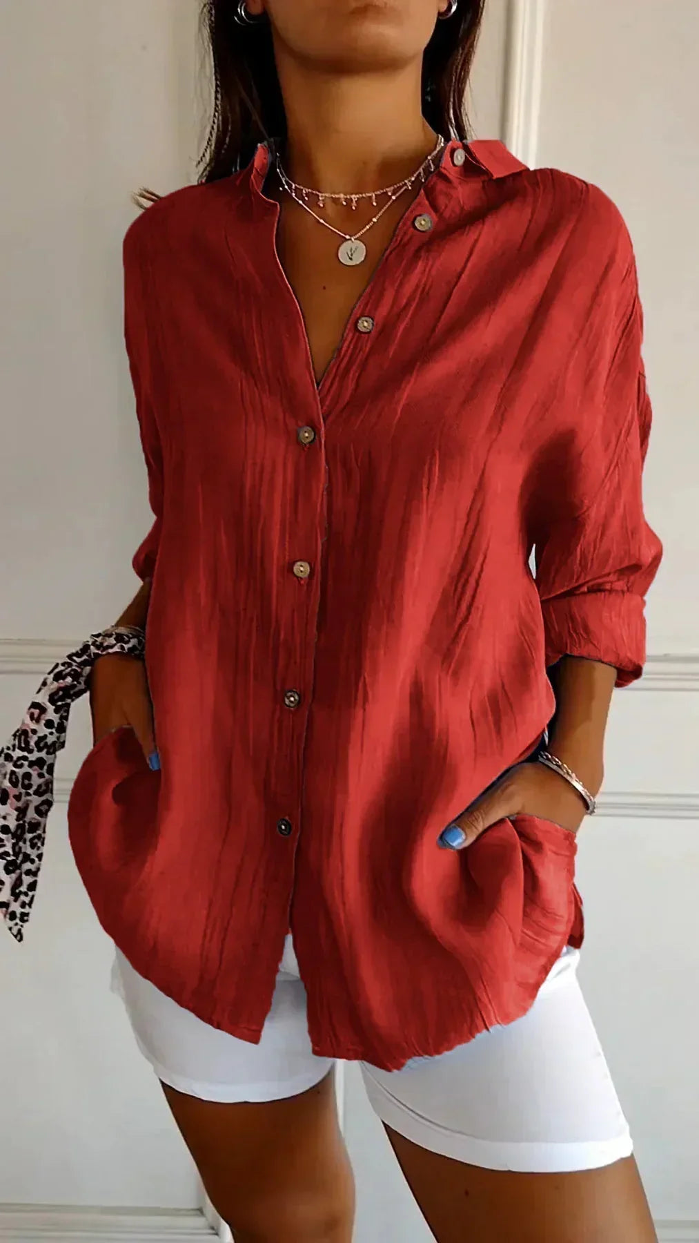 Stylish women's pleated top. A comfortable, lightweight blouse suitable for work and casual wear.