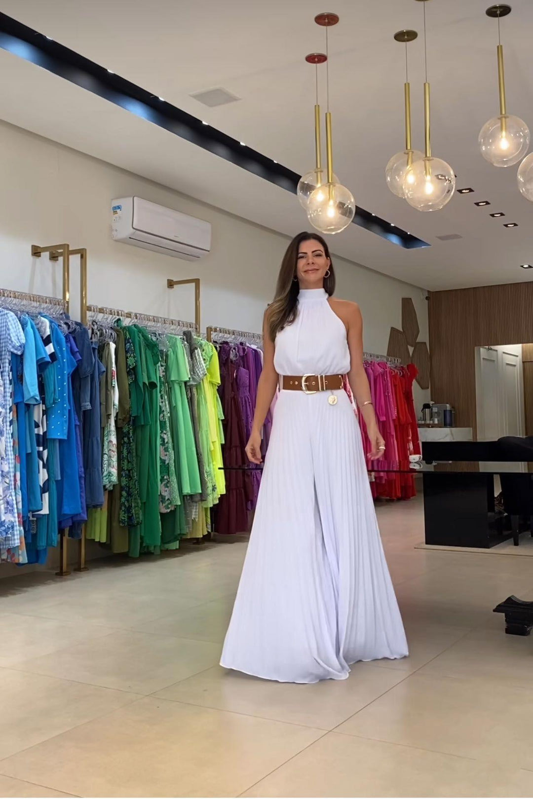 Comfortable plissé jumpsuit for women. Fashionable, airy clothing ideal for summer, resort, or everyday chic.