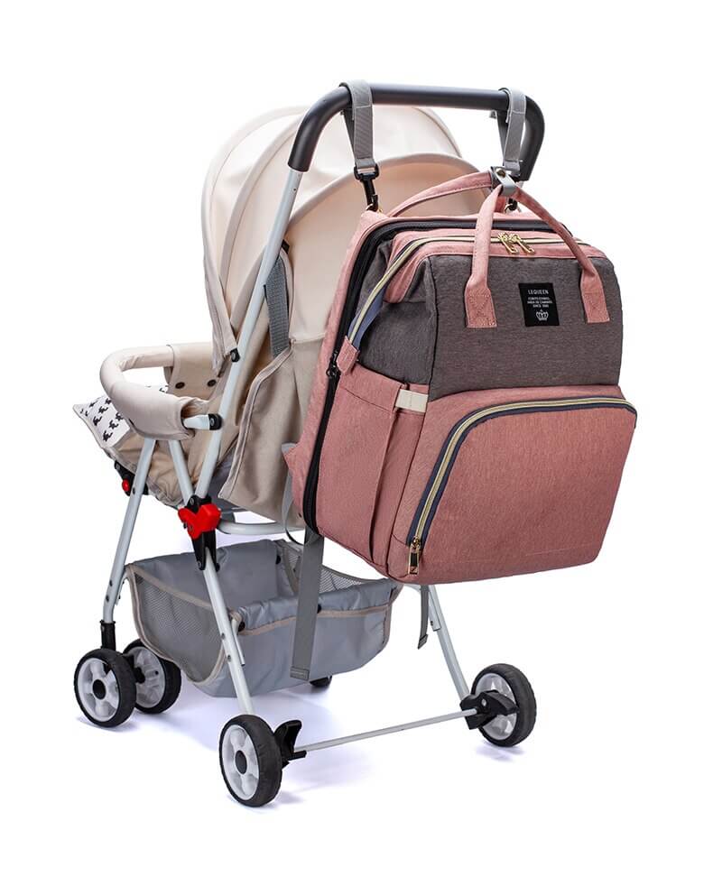 Practical nappy bag & travel backpack for baby essentials, converts to a portable bed.