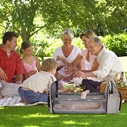 All-in-one baby travel solution: portable bed, nappy bag, and ergonomic backpack for parents.
