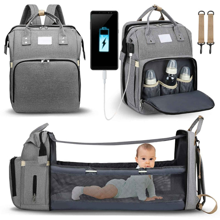 Organized baby travel bag with multiple compartments, a portable bed & nappy changing area.
